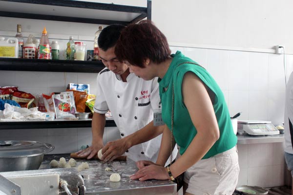 在煌旗学做狗不理包子技术大概多少学费